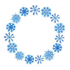 Winter wreath with blue watercolor snowflakes on white background. Circle.
