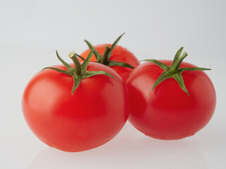 Tomato isolated food ripe red group ingredient. Ripe tomatoes top view.