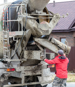 Concrete mixing machine at a construction site.