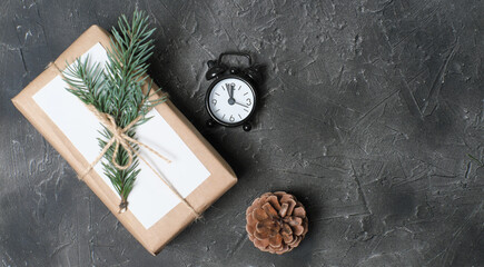 minimal style christmas wrapping of gifts. paper present decor. eco gifts with natural fir tree decoration on grey background