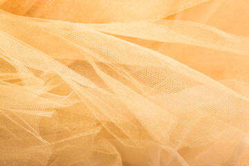 texture of gold-toned tulle fabric detail