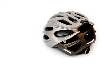 Fototapeta premium Cycling helmet plastic gray metal color, to protect the head of the cyclist during the trip.