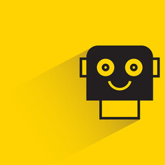 robot head with drop shadow on yellow background