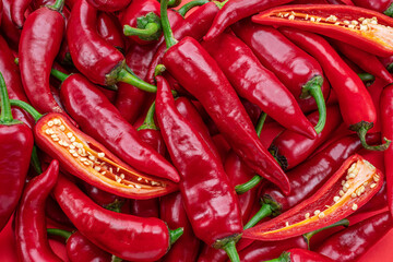 Lot of fresh red chilli peppers. Food background.