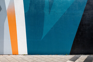  Modern urban scene with empty street and colorful geometrical wall. Creative modern urban city...