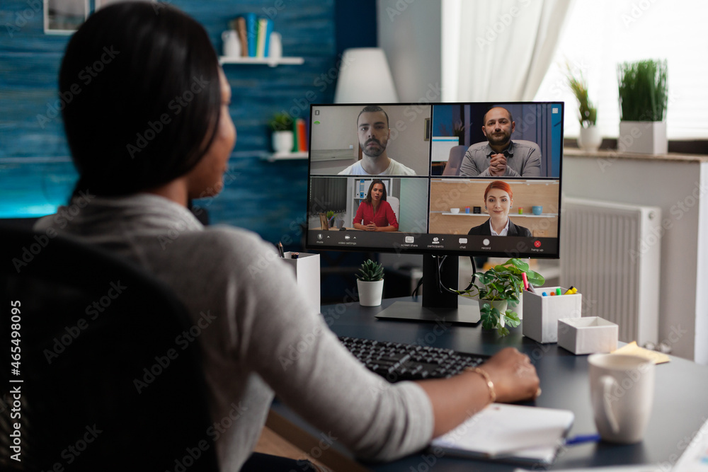 Poster worker using video call communication with colleagues to do business meeting and remote work on comp