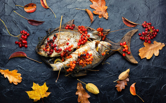 Baked fish in viburnum syrup