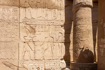 Ruin of Karnak Temple, ancient Egyptian murals and writings on the stone walls Luxor, Egypt
