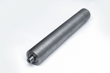 Steel metal pipe-shaft made on a lathe for the factory conveyor industry.