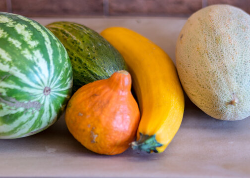picture with pumpkin, zucchini, watermelon and melon, autumn harvest time, suitable for vegetarian dishes, vegetables for a healthy diet, autumn