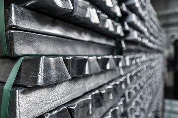 Aluminum ingots - aluminum - industrial production - material pile - Powered by Adobe