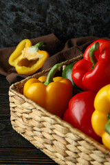 Concept of tasty food with bell pepper on wooden table