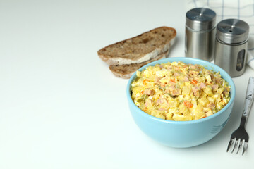 Concept of tasty food with Olivier salad on white background