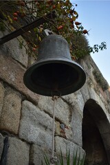 
A pretty bell hanging in the Castle of Granadilla in Cáceres