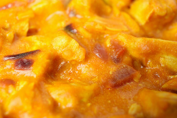 Chicken tikka all over background, close up