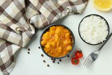 Concept of tasty food with chicken tikka on white background