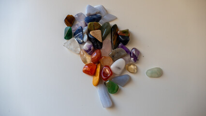 Colorful Small Natural Stones on a White Background
