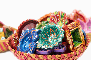 Multicolored Oil Lamps Known As Diya, Deep, Diyo Or Deepam In Bamboo Basket. Its Used By Hindu,...