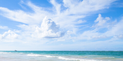 Naklejka na ściany i meble Caribbean Sea view under cloudy blue sky