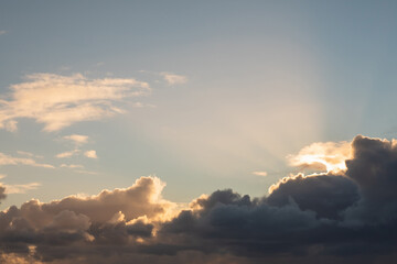 Beautiful cloudy sky with different cloud shape. Warm and cool tone
