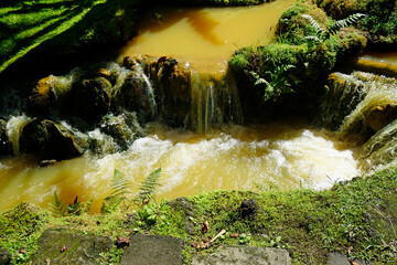 small waterfall in furnas on the azores islands