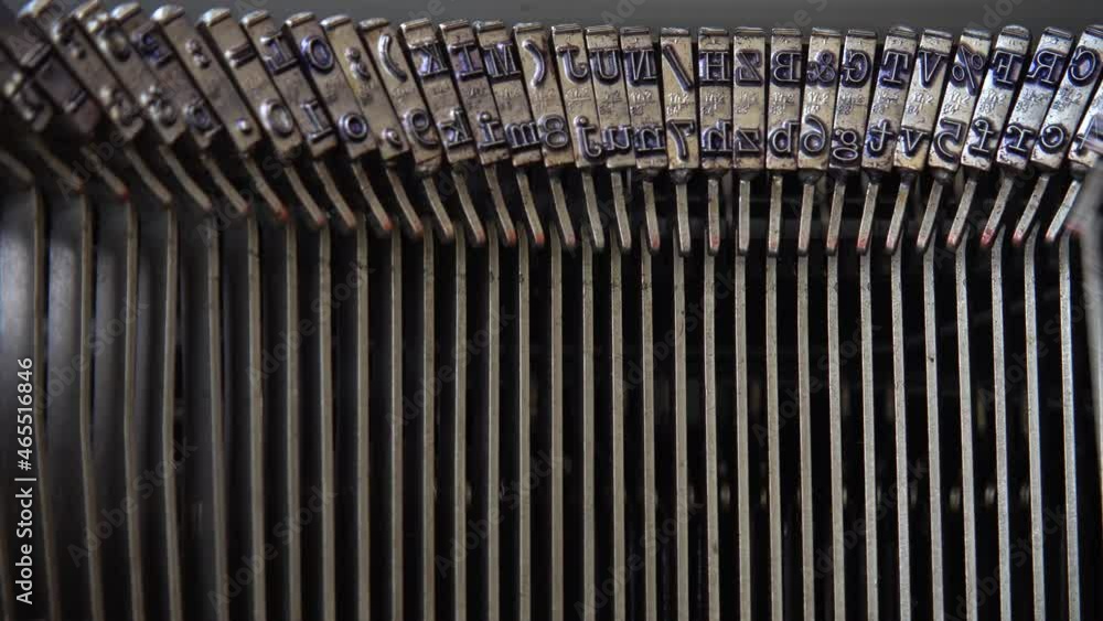 Poster mechanism of a retro typewriter. old typewriter hammers. close up.