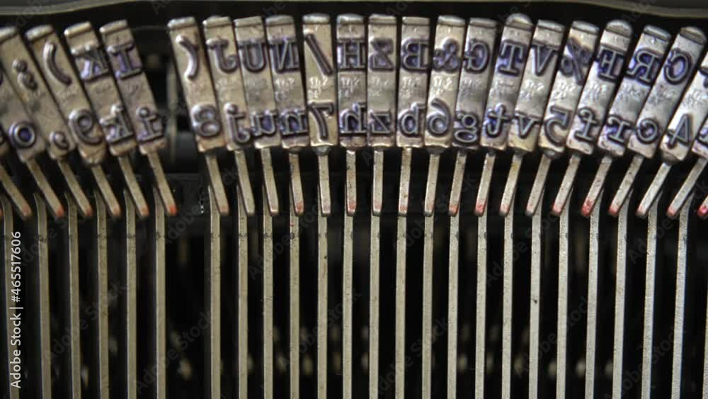 Poster mechanism of a retro typewriter. old typewriter hammers. close up.