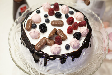 Birthday cake. Tasty dessert with fruit and chocolate. Homemade prepare.