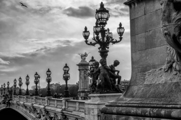 Fototapeta premium A wonderful black and white picture of bridge design with many sculptures, statues and lanterns