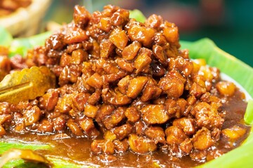 Sweet Pork Condiment, Thai streaky pork with coconut or palm sugar and black sauce, thai street food market