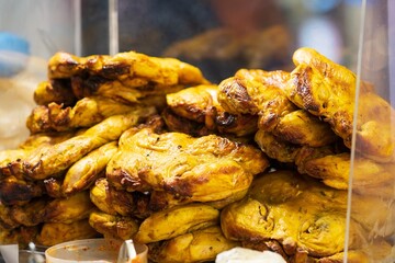 Closeup of Grilled chicken with turmeric, thai street food market