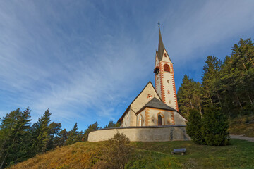 Fototapeta na wymiar San Giacomo church in Dolomites mountains, North of Italy