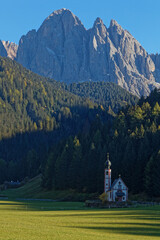 Fototapeta na wymiar San Giovanni church in its landscape, Val di Funes, Dolomites mountains, North of Italy