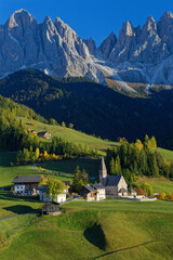 Fototapeta na wymiar Landscape of Santa Maddalena Alta, Val di Funes, on the italian Dolomites, with fall colors