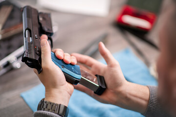 Gun in the hand of man