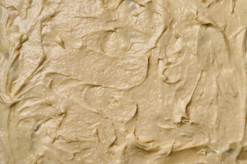Macro selective focus raw dough texture backdrop. Free space for design