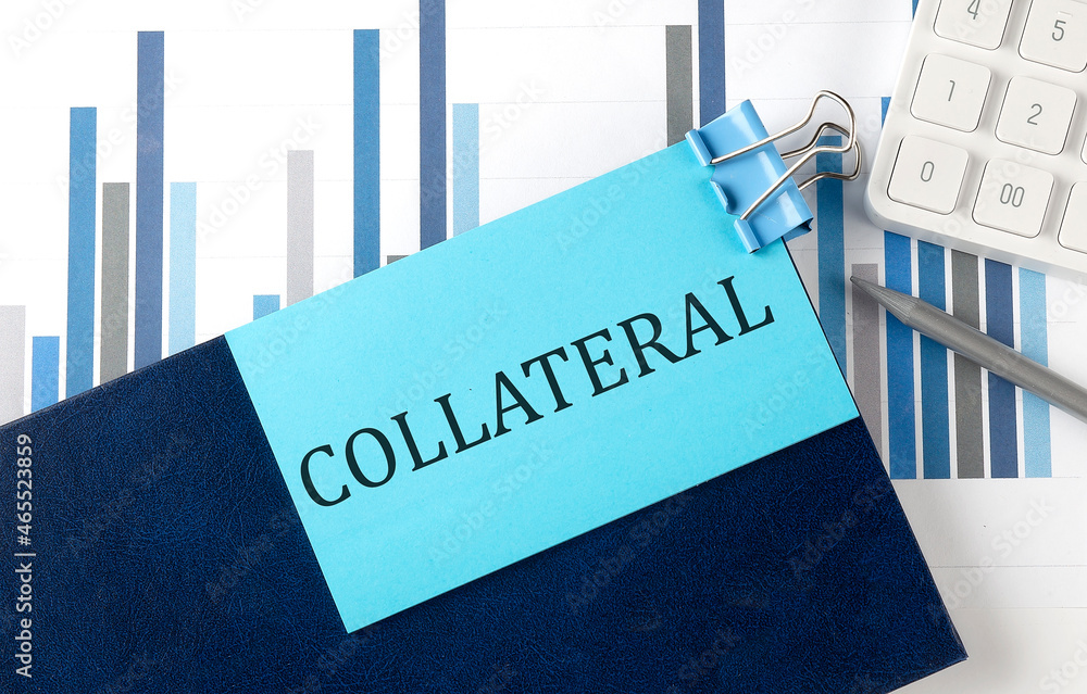 Aufkleber collateral on sticky note on notebook on the chart background