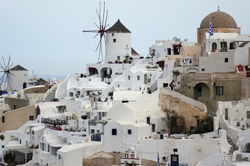 Houses and a windmill in Oia of Santorini