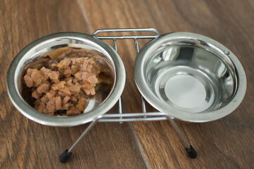 Wet food for dogs and cats in a bowl close up