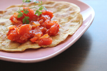 Whole wheat flour crepe with tomato sauce