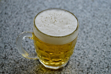 A Dutch lager in a glass on the table
