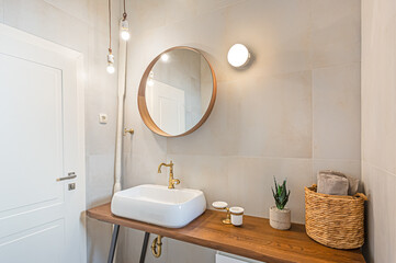 Bathroom vessel sink with golden color tap