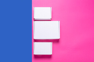 Set, lot of white cardboard box on color background, top view