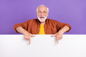 Photo of cool elder man index ad wearing eyewear brown shirt isolated over purple color background