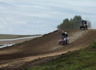 Obraz premium motocross, biker, motorcyclist, athlete, motorcycle with cradle