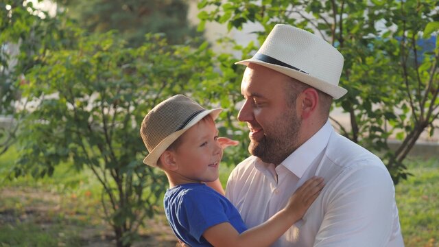 A Little Boy Hugs His Beloved Father, Dad Is In The Arms Of His Son, Happy Family Life, Father's Day, Raising A Kid In Family, Child Life With An Older Parent, Raising Baby As Man, Cheerful Childhood