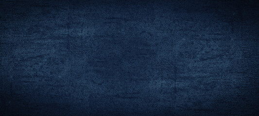 Dark blue scratched colorful colored stone concrete paper wall texture structure surface background pattern, with dark vignette