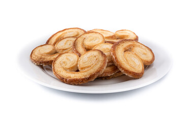 Palmier puff pastry in plate isolated on white background