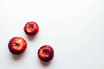 Ripe juicy red rayal gala apples on grey backgroung. Top view. Flat lay, top view, copy space. Autumn composition.