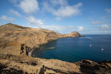 Ilhéu da Cevada, Madeira, view over rocks and sea with cloudy sky